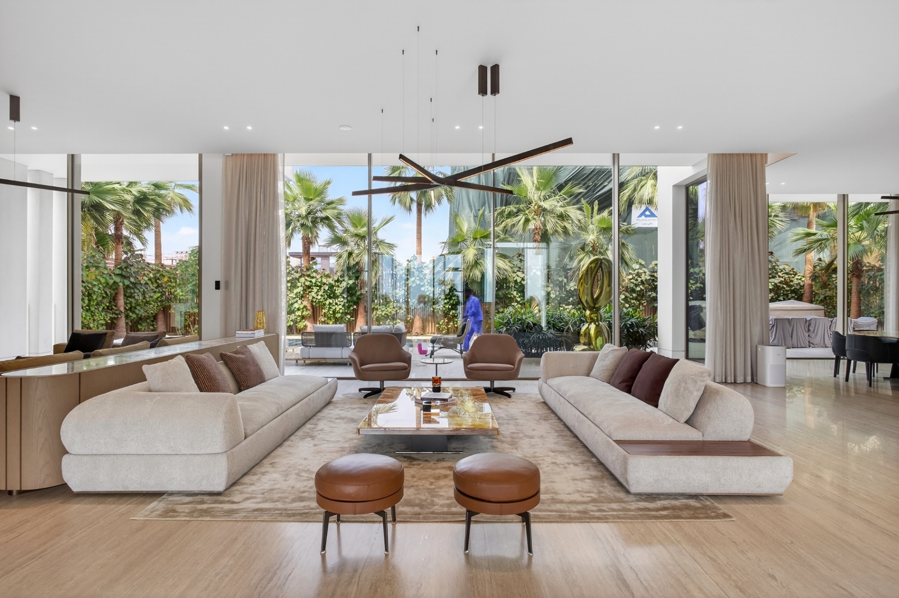 Villa A17 grand living room with floor-to-ceiling glass and garden views